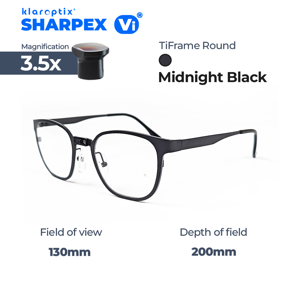 Black Sharpex Vi® 3.5x magnifying lens from Klaroptix with round shape, showcasing its compact and sleek design.